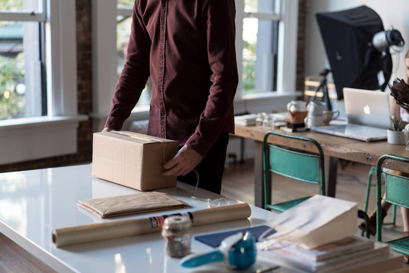 Small business owner preparing online store orders